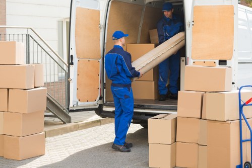 Moving van and boxes for house removals in Brixton