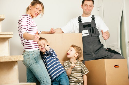 Unpacking boxes in a new Brixton home